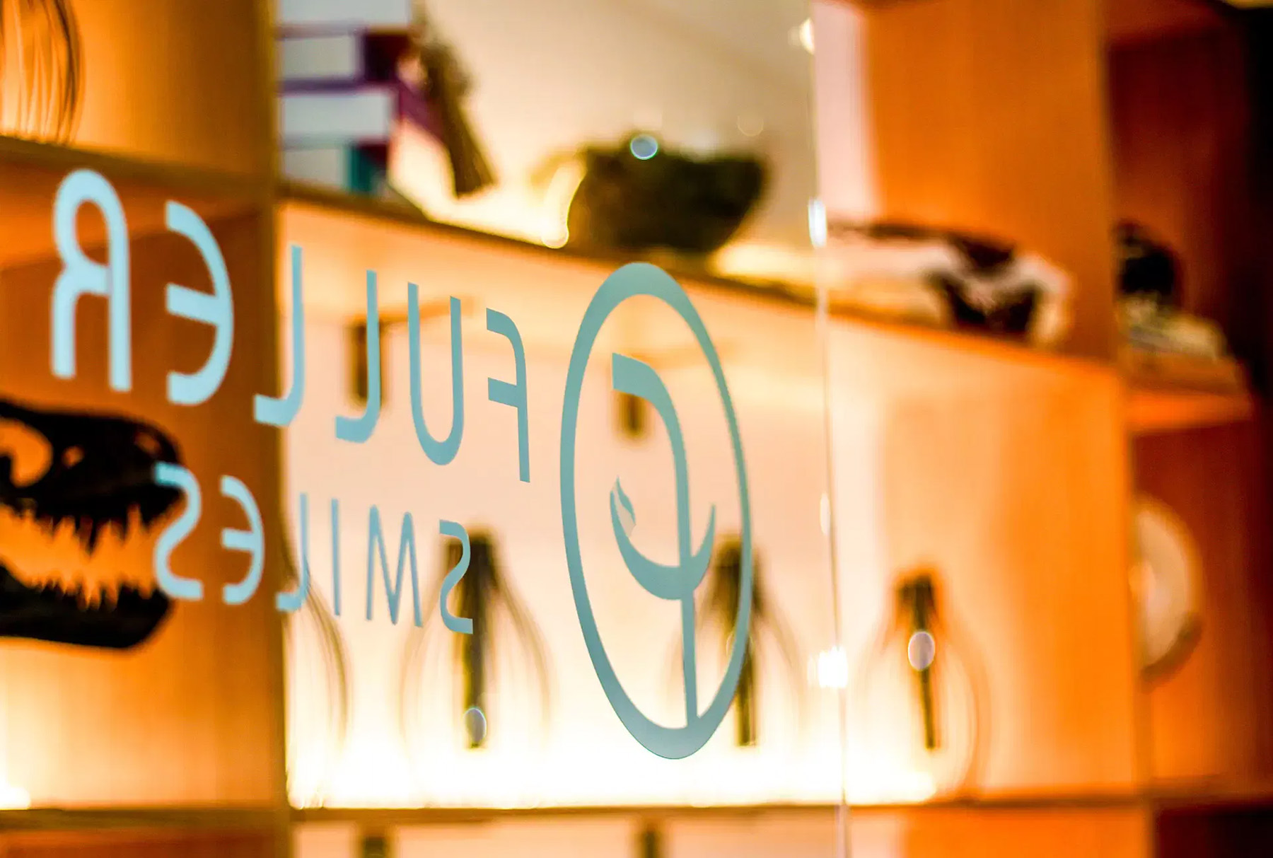 The image shows a storefront with a sign that reads Soulful and features an abstract design, set against a backdrop of shelves displaying various items.